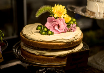 Obraz na płótnie Canvas pastries in bakery case with frosting