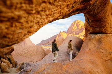 Family hiking in Spitzkoppe Namibia