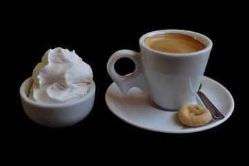 coffee and chantilly cream in a black background