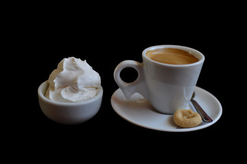 coffee and chantilly cream in a black background