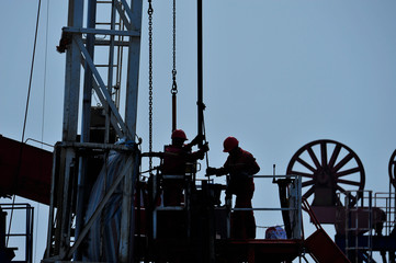 The oil workers in the job