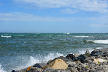 The jetty at the end of Oregon Inlet beach in the Outer Banks of North Carolina