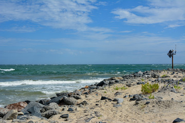 The jetty at the end of Oregon Inlet beach in the Outer Banks of North Carolina