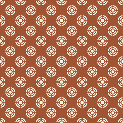 Abstract geometric circle aim target seamless pattern. Dark orange & white.
