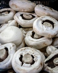 A stack of raw mushrooms are for sale at a market stall at the Queen Victoria Market in Melbourne Australia