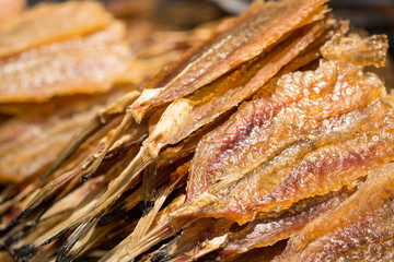 Monkfish drying on stacks. dried anglerfish