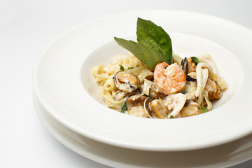 seafood pasta in a white background