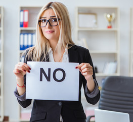 Young businesswoman with message in the office