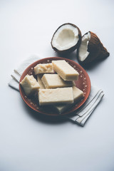 Coconut Burfi / Kopra  Pak/ Fresh Nariyal Fudge, selective focus