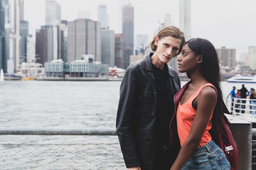 Fototapeta premium Attractive young, mixed race couple together outside in New York