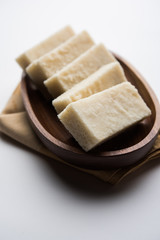 Coconut Burfi / Kopra  Pak/ Fresh Nariyal Fudge, selective focus