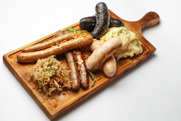 sausages on a wood with a cabbage