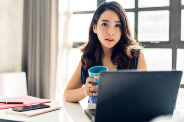 Businesswoman working with laptop computer.creative business people planning at modern work loft