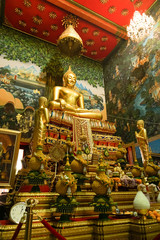 golden buddha statue in temple in thailand