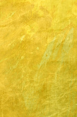 Gold background texture, elegant yellow vintage paper illustration with grunge scratches and wrinkled creases in luxury antique design