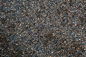 The texture of a shallow river stone. Pebble Background Image