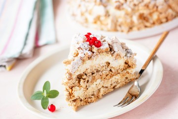 Ukrainian Kiev Cake Slice On White Plate. Tasty Hazelnut Meringue Cake