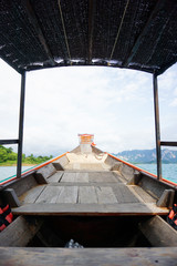 Wooden Thai Traditional Long Tail Boat on Chiao Lan Dam Portrait Khao Sok National Park in Thailand Holiday