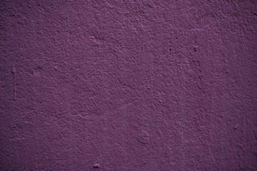 Texture of an old wall covered with paint. Background image of a worn paint coated surface