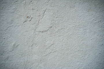 Texture of an old wall covered with paint. Background image of a worn paint coated surface