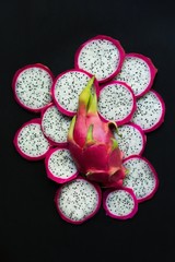 Cut dragon fruit with black background