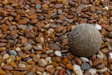 Stone balls and pebbles on the ground