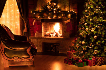 Christmas living room interior with decorated fireplace, armchair and xmas tree