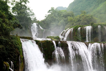 Scenic dreamy view of Ban gioc or Detian waterfalls that separates Cao bang Vietnam and Guangxi China © MarieXMartin