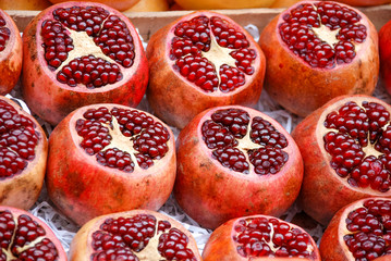 Bunch of Pomegranates on the greengrocer market.