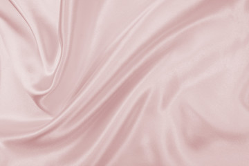 Obraz premium Delicate satin draped fabric pink texture for festive backgrounds
