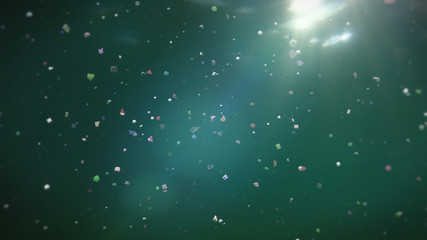 microplastics floating in ocean water, micro plastic pollution