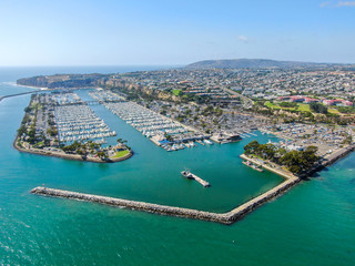 Fototapeta na wymiar Aerial view of Dana Point Harbor and her marina with yacht and sailboat. southern Orange County, California. USA
