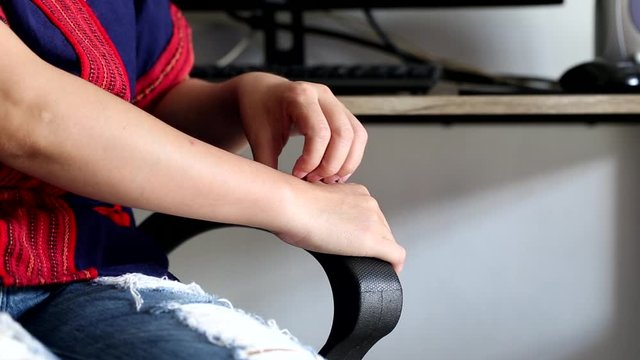 Young woman scratching the itch on her hands, Health care and Medicine concept