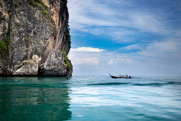 Naklejka na ściany i meble Beaty limestone rock in the ocean, Krabi, Thailand.