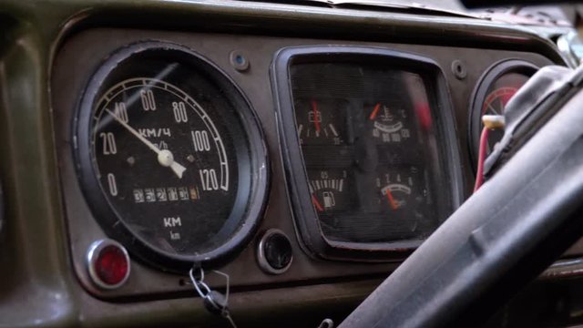 Old Truck Dashboard, Speedometer, and other Indicators. Vintage Military Vehicle
