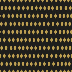Seamless pattern of gold colored rhombus on black background