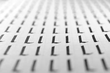 Handwriting black and white symbol filling pattern. Calligraphic letter L learning skills paper...