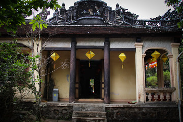 Fototapeta premium Facade of the ancient Tu Hieu Pagoda in Hue, Vietnam