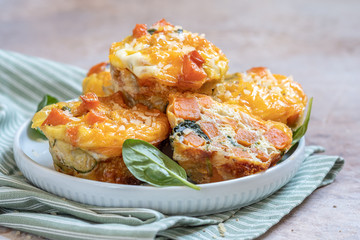 Delicious egg muffins with sweet potato, spinach and onion