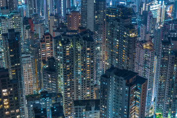 Fototapeta na wymiar High rise residential building in Hong Kong city at night
