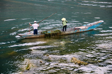High angle view of fishermen fishing in the Son River in Phoung Nha, Vietnam