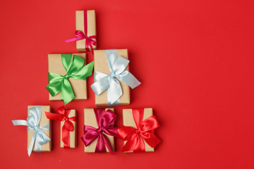 Gifts packed with craft paper and colorful satin ribbons