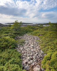 Rocky seashore. Summer landscape of a rocky island in the Baltic Sea, Finland.