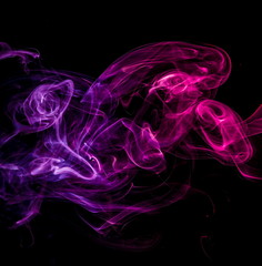 Colored smoke on black background