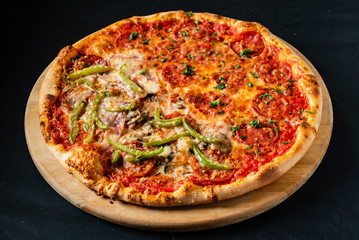 pizza on the black background