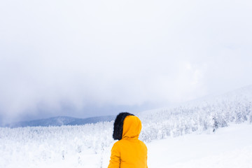 Young woman of the frozen forest with snow monster in winter, Japan