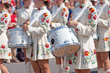 Marching band drummers perform, drummers parade in ukrainian costume