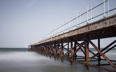 Obraz premium Abounded bridge at black sea near Primorsko, Bulgaria. Long exposure.