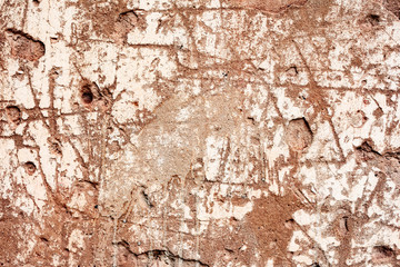 Texture of a concrete wall with cracks and scratches which can be used as a background