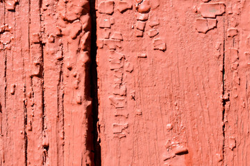 Old wooden painted wall brown color close up. Abstract background
